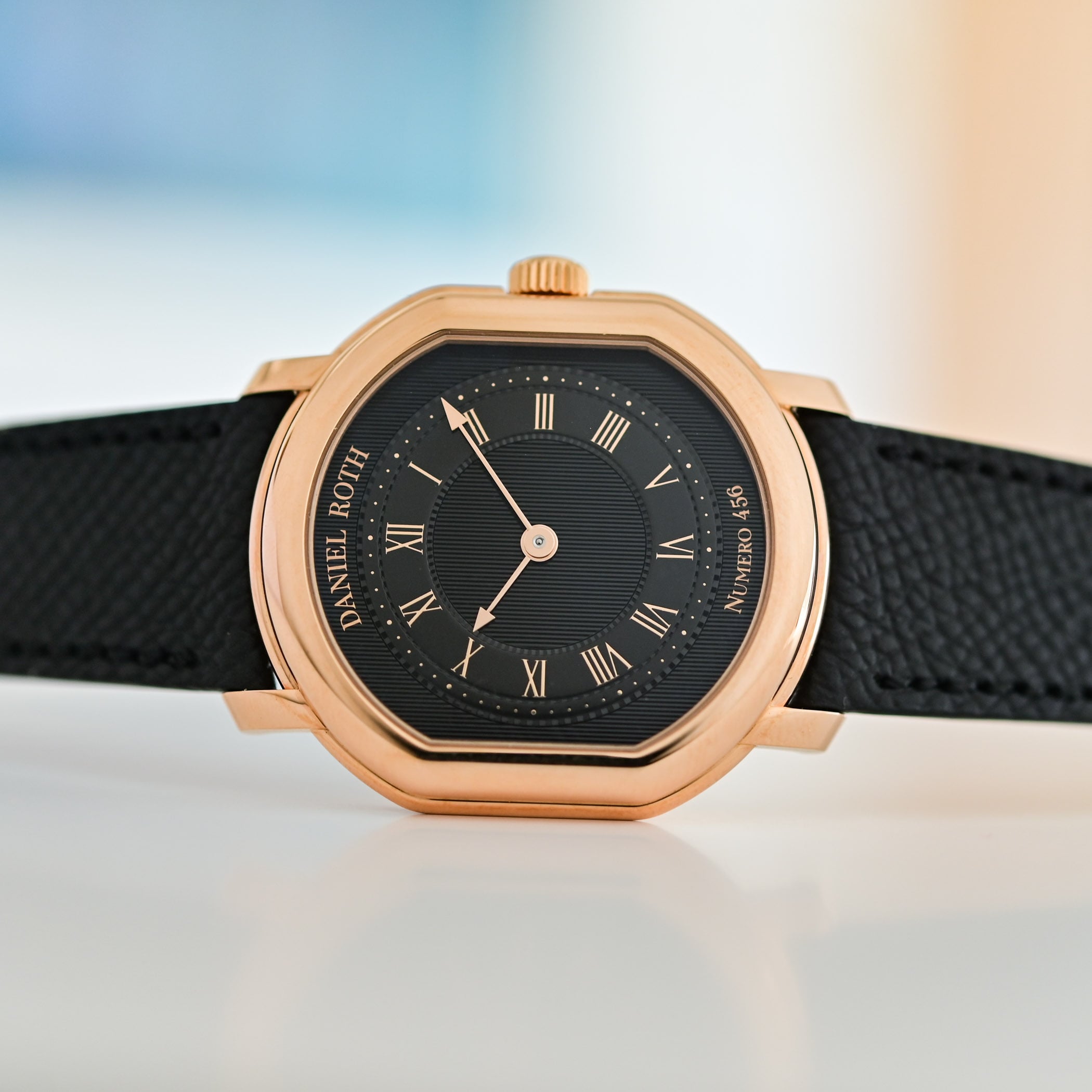 Daniel Roth Extra Plat in rose gold with a black gilt guilloche dial and gold Roman numerals