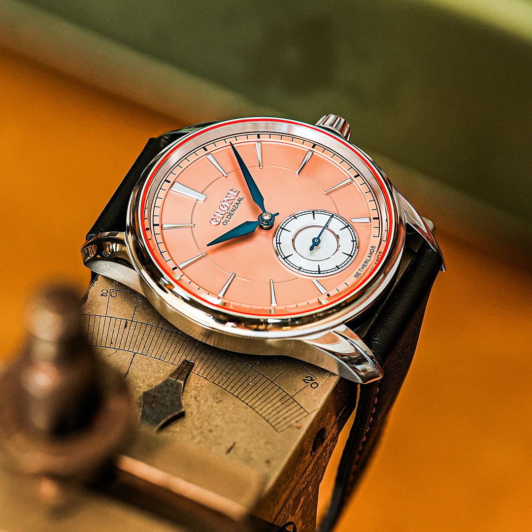 GRØNE Horologium on wrist, showing case profile and downward-curving lugs