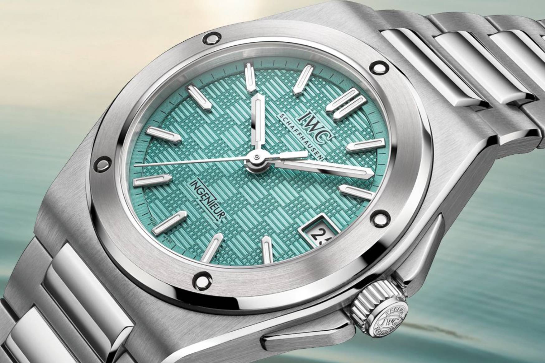Angled view of the IWC Ingenieur Automatic 35 Pool showing the case profile, polished bevels, integrated H-link bracelet and Pool blue dial