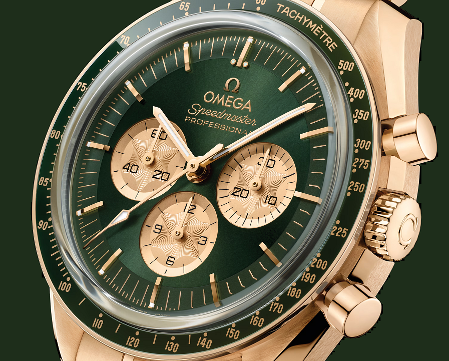 Front view of the Omega Speedmaster Moonshine gold green step dial showing the three new Moonshine gold subdials with azurage pattern
